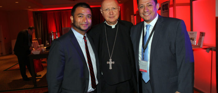 Picture of a priest and 2 men