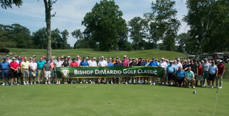 group photo at 2019 Bishop DiMarzio Golf Classic