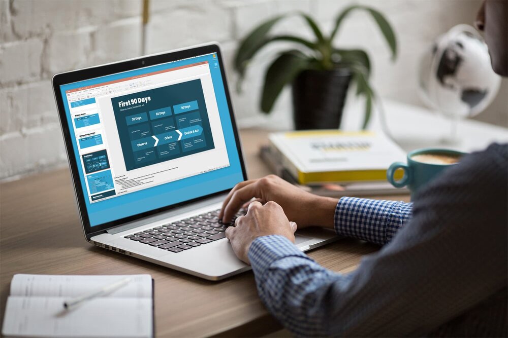 person sitting with laptop